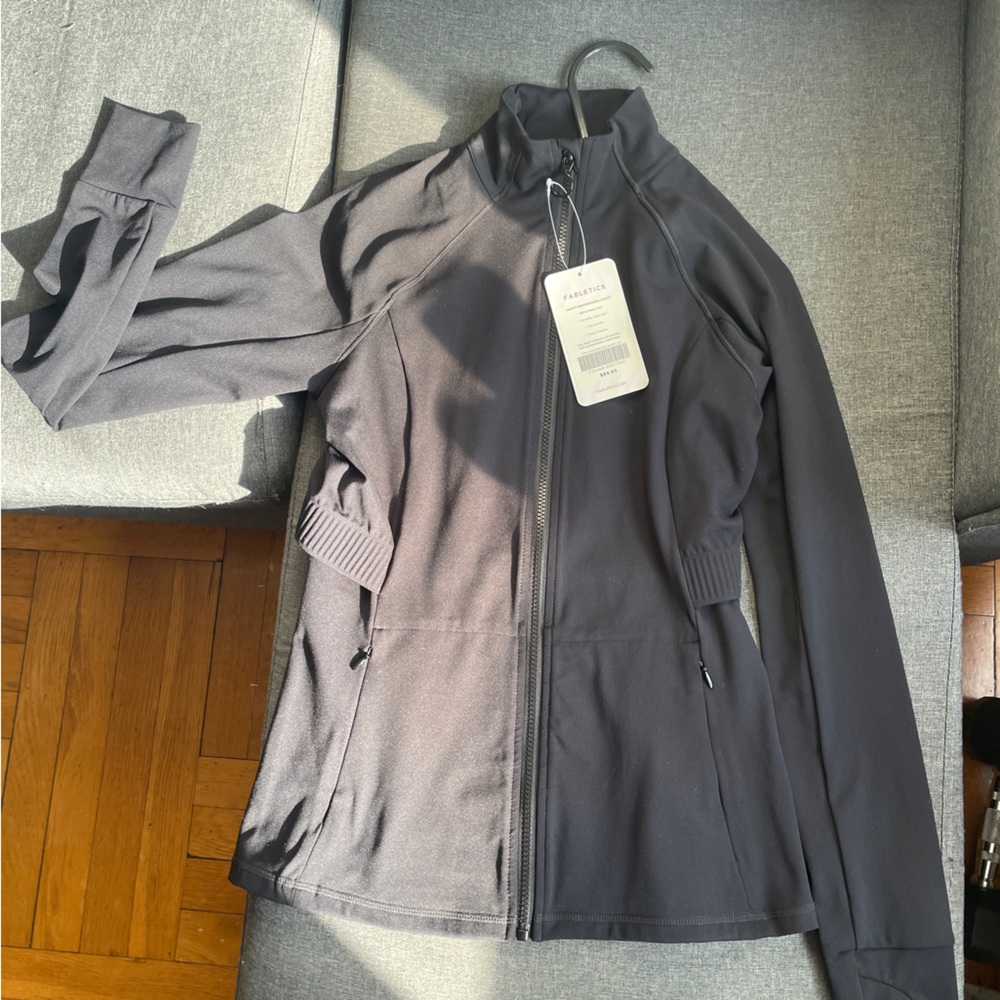 Fabletics zip workout jacket. Never worn. Great condition